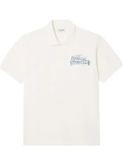 Polo en coton blanc avec un motif une coupe droite et un col à revers