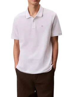Polo en coton blanc à coupe droite pourvu d'un col à revers boutonné