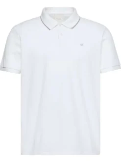 Polo en coton blanc à coupe droite pourvu d'un col à revers boutonné