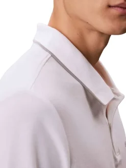 Polo en coton blanc à coupe droite pourvu d'un col à revers boutonné