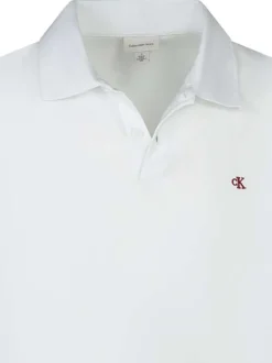 Polo en coton blanc maille piquée avec un col à revers et une coupe droite