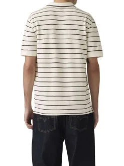 Polo en coton blanc à rayures avec une coupe droite et un col boutonné