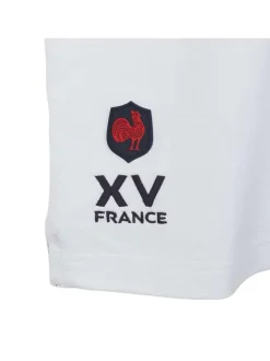 Polo en coton blanc tricolore coupe droite avec un col boutonné