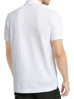 Polo en coton blanc uni avec une coupe droite et un col boutonné