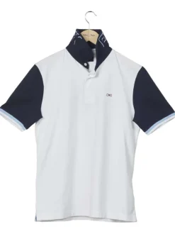 Polo en coton blanc uni coupe droite avec un col boutonné et logo