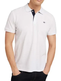 Polo en coton blanc uni coupe droite avec un col fermé par 2 boutons