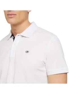Polo en coton blanc uni coupe droite avec un col fermé par 2 boutons