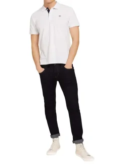 Polo en coton blanc uni coupe droite avec un col fermé par 2 boutons