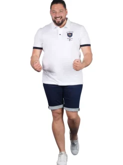 Polo en coton blanc uni pourvu de manches courtes et d'une coupe droite