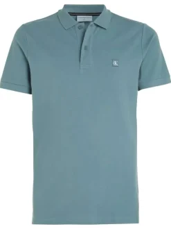 Polo en coton bleu avec une coupe droite un col boutonné et logo à la poitrine