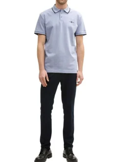Polo en coton bleu ciel uni à coupe regular fit avec des liserés sur le col