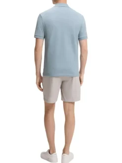 Polo en coton bleu à coupe droite pourvu d'un col côtelé boutonné