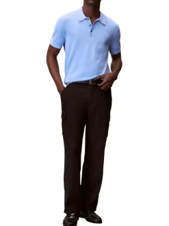 Polo en coton bleu à coupe droite pourvu d'un col à revers boutonné