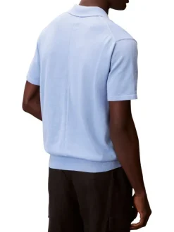 Polo en coton bleu à coupe droite pourvu d'un col à revers boutonné