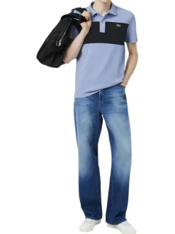 Polo en coton bleu à coupe droite pourvu d'un col à revers côtelé