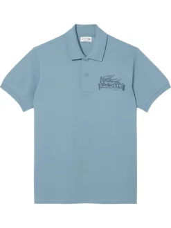 Polo en coton bleu en maille piquée avec une coupe droite et un col à revers