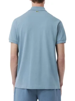 Polo en coton bleu en maille piquée avec une coupe droite et un col à revers
