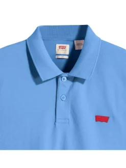 Polo en coton bleu en maille piquée avec une coupe slim et un col boutonné