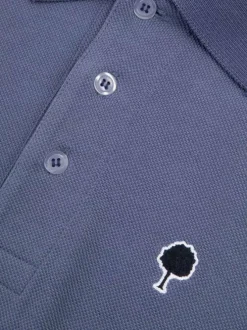 Polo en coton bleu gris uni avec une coupe droite et un col boutonné