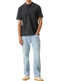 Polo en coton bleu marine uni avec une coupe droite et un col à revers