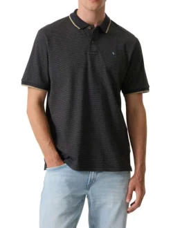 Polo en coton bleu marine uni avec une coupe droite et un col à revers