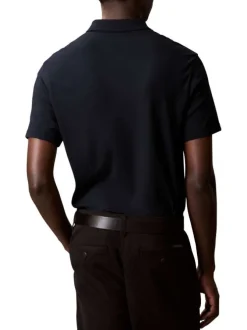 Polo en coton bleu marine uni à coupe regular fit avec le mini logo brodé