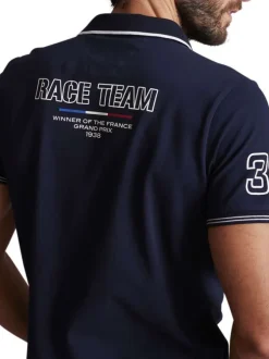 Polo en coton bleu marine uni à coupe slim fit avec un col v à revers