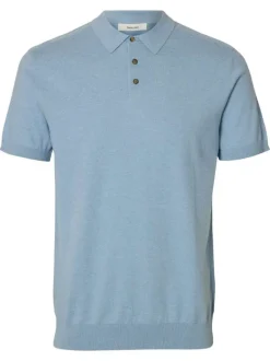 Polo en coton bleu uni avec une coupe droite et un col boutonné