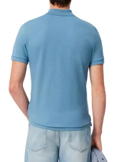 Polo en coton bleu uni avec une coupe droite et un col français