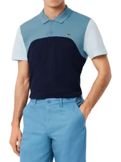Polo en coton bleu uni avec une coupe droite et un col français