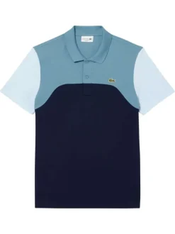 Polo en coton bleu uni avec une coupe droite et un col français