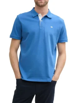 Polo en coton bleu uni à coupe regular fit avec un col à revers et le logo brodé