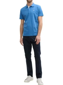 Polo en coton bleu uni à coupe regular fit avec un col à revers et le logo brodé