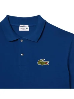 Polo en coton bleu uni droit avec logo à la poitrine et col à deux boutons