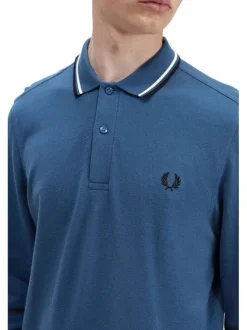 Polo en coton bleu uni à manches longues avec liserés sur le col français