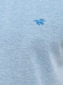 Polo en coton bleu uni pourvu d'un col boutonné et d'une coupe droite