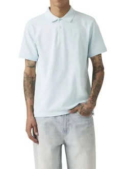 Polo en coton ciel uni avec une coupe droite et un col boutonné