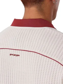 Polo en coton écru avec logo à coupe droite et à col boutonné