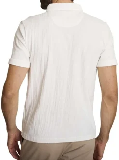 Polo en coton écru à coupe droite pourvu d'un col à revers boutonné