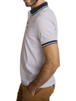 Polo en coton écru à motifs avec une coupe droite et un col boutonné