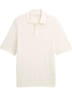 Polo en coton écru uni avec une coupe droite et un col boutonné