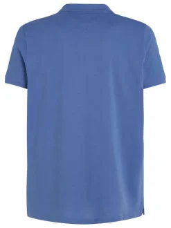 Polo en coton indigo uni avec un col boutonné et une coupe droite