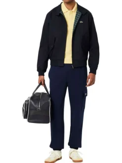 Polo en coton jaune chiné avec une coupe slim fit et le petit crocodile brodé