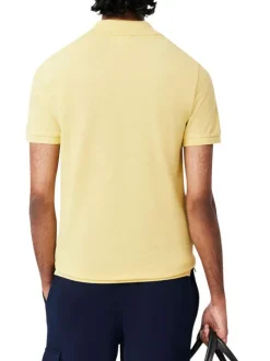 Polo en coton jaune chiné avec une coupe slim fit et le petit crocodile brodé
