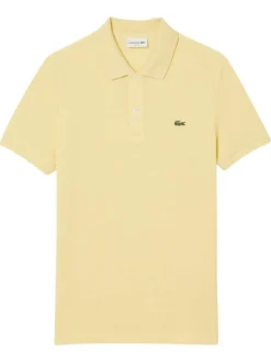 Polo en coton jaune chiné avec une coupe slim fit et le petit crocodile brodé