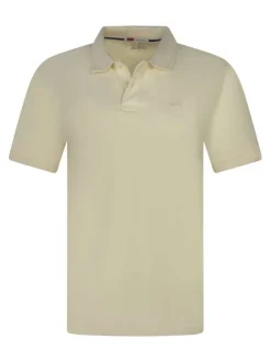 Polo en coton jaune uni avec une coupe droite et un col boutonné