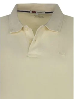 Polo en coton jaune uni avec une coupe droite et un col boutonné