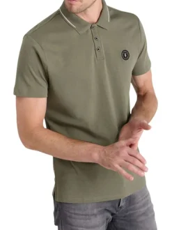 Polo en coton kaki uni à coupe slim fit avec un liseré sur les revers