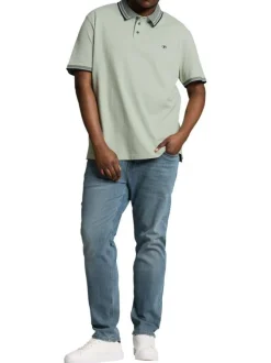 Polo en coton kaki uni pourvu d'une coupe droite et d'un col boutonné