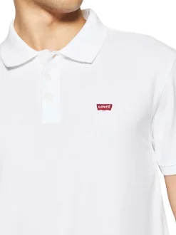 Polo en coton maille piquée blanc avec une coupe droite et un col boutonné